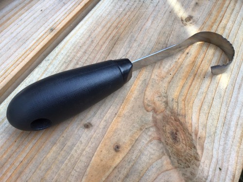 Duister Chinees keukengereedschap. Om iets uit te hollen?